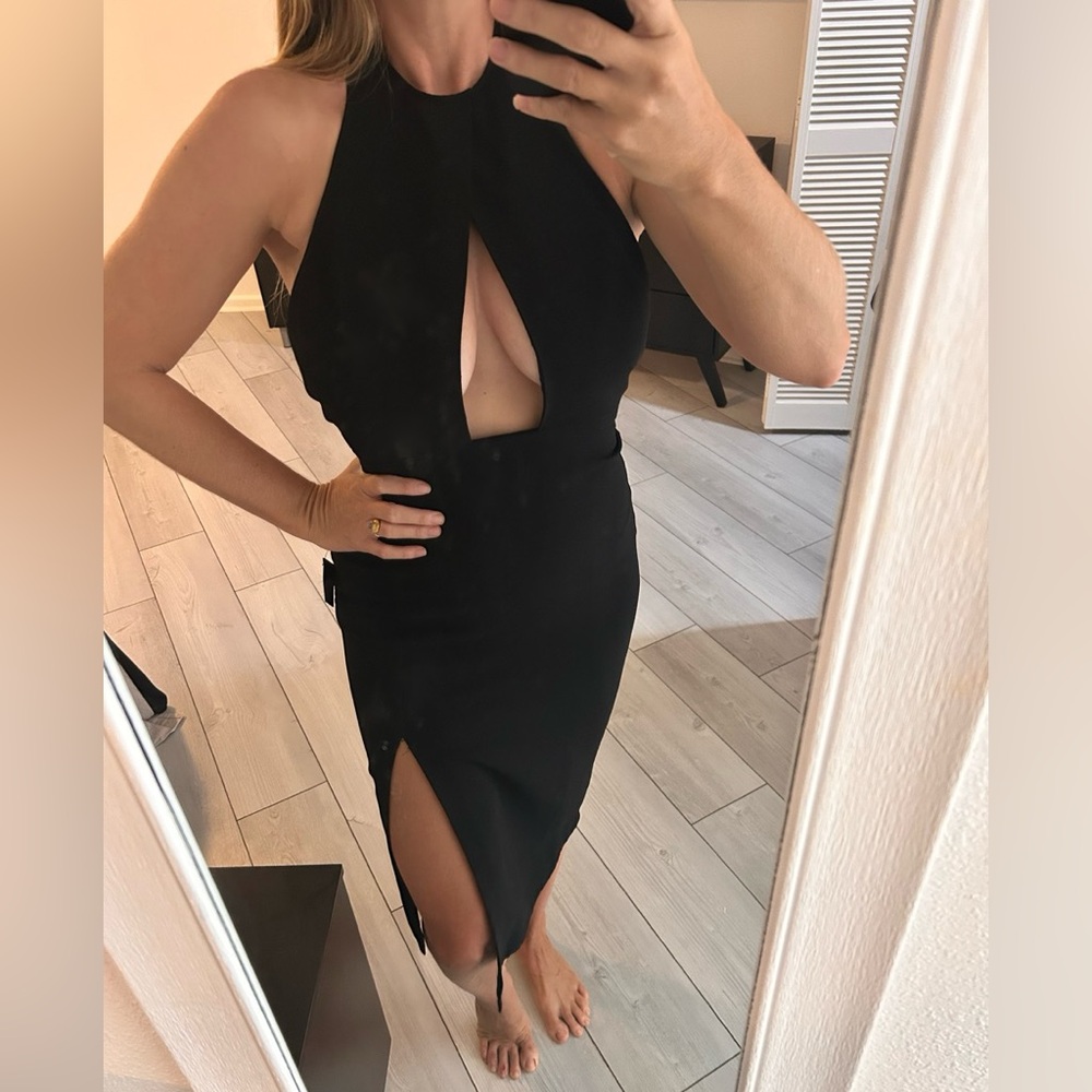 NASTY GAL NWT Sexy Black Halter Dress. Super flattering cut. New. Size small.